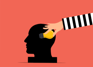 A hand in a striped sleeve takes a yellow light bulb from a black silhouette of a human head, symbolizing the theft of an idea or intellectual property, set against a red background.